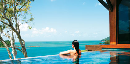 See the famous Heart Reef from the air and the ocean with the luxurious Qualia as your base.